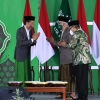 Catatan Muktamar Lampung, di Balik Sarung Presiden