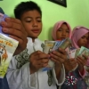 Angpao untuk Anak-anak di Hari Raya IdulFitri, Uang Baru?