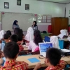 Menapaki Jalan Digitalisasi dan Reboisasi Melalui Kampus Merdeka di SDN Ibu Dewi 7 Cianjur