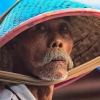 Puisi: Tatapan Kosong Lelaki Piatu Bertopi Lebar Berbahan Bambu