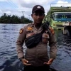Banjir di Jalan Lintas Timur Pelalawan Mulai Surut, Namun Akses Lalu Lintas Belum Stabil Dilewati