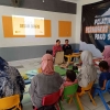 Mahasiswa Universitas Muhammadiyah Malang Latih Guru Kembangkan Perangkat Pembelajaran