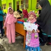 Aira, 7 Tahun: Pahlawan Lingkungan Cilik Ciptakan Fesyen Ramah Lingkungan dari Limbah Saset Anti Noda
