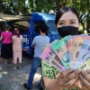 Menyoal Kebijakan Bank Indonesia Pertontonkan Penukaran Uang Secara Terbuka
